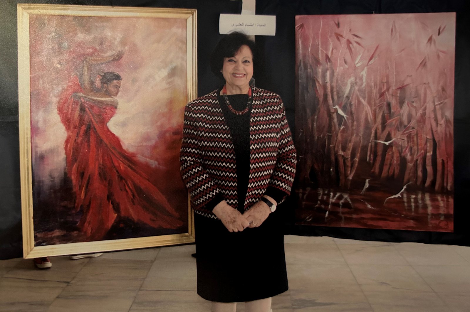 Ebtisam Zaki at an exhibition of her paintings
